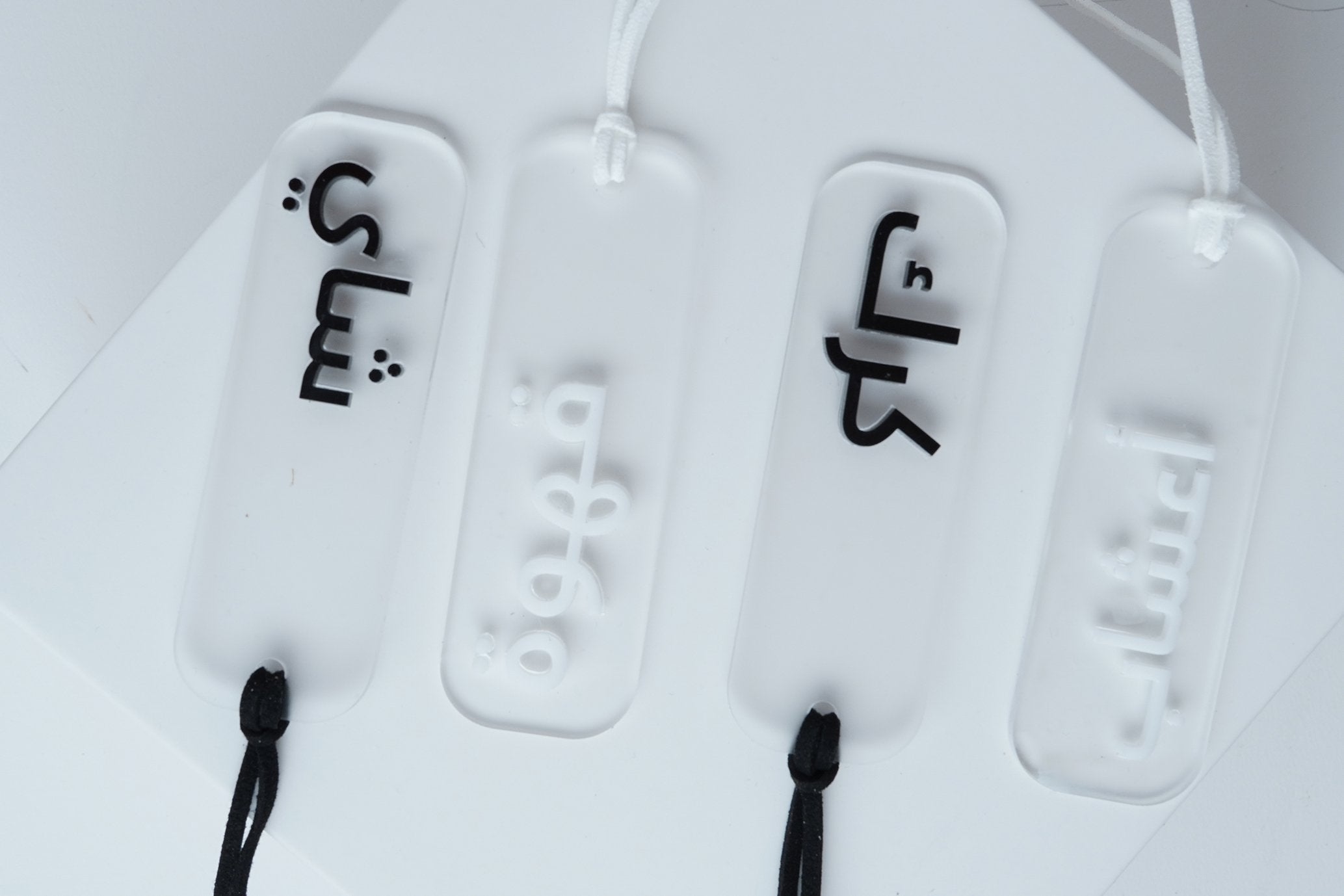 set of 4 acrylic tags , light font