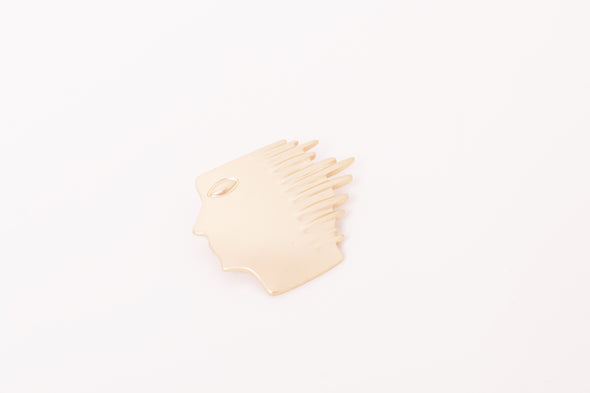 face brooch 2